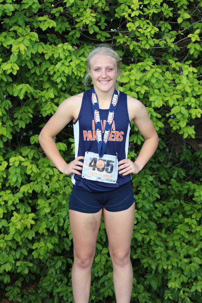 Bri Sarver bringing home a state medal in the 100 m dash.