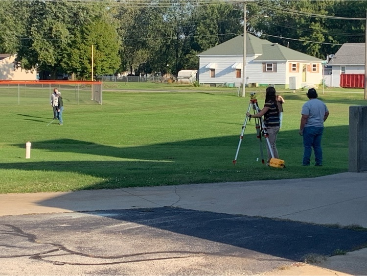 Mrs. Ruppert helping with the leveling.